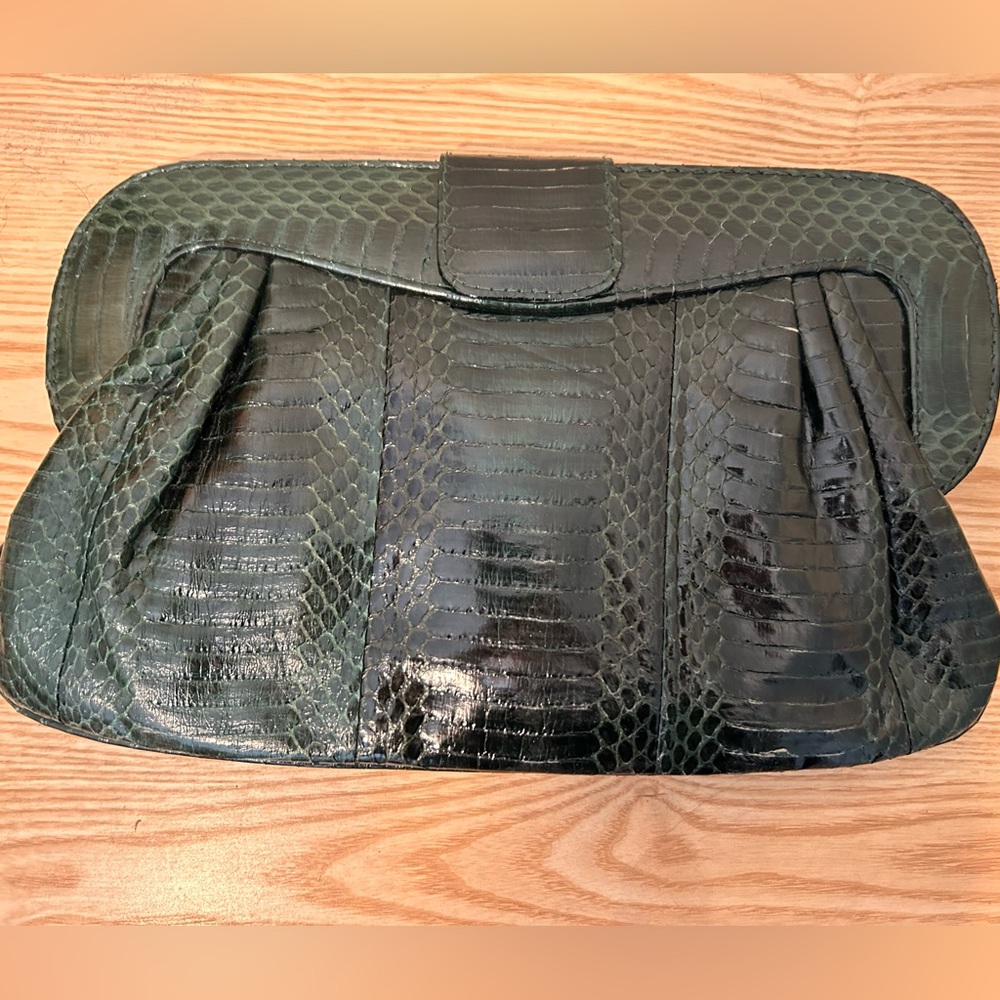 Angel Jackson Chandra genuine snakeskin clutch in dark green